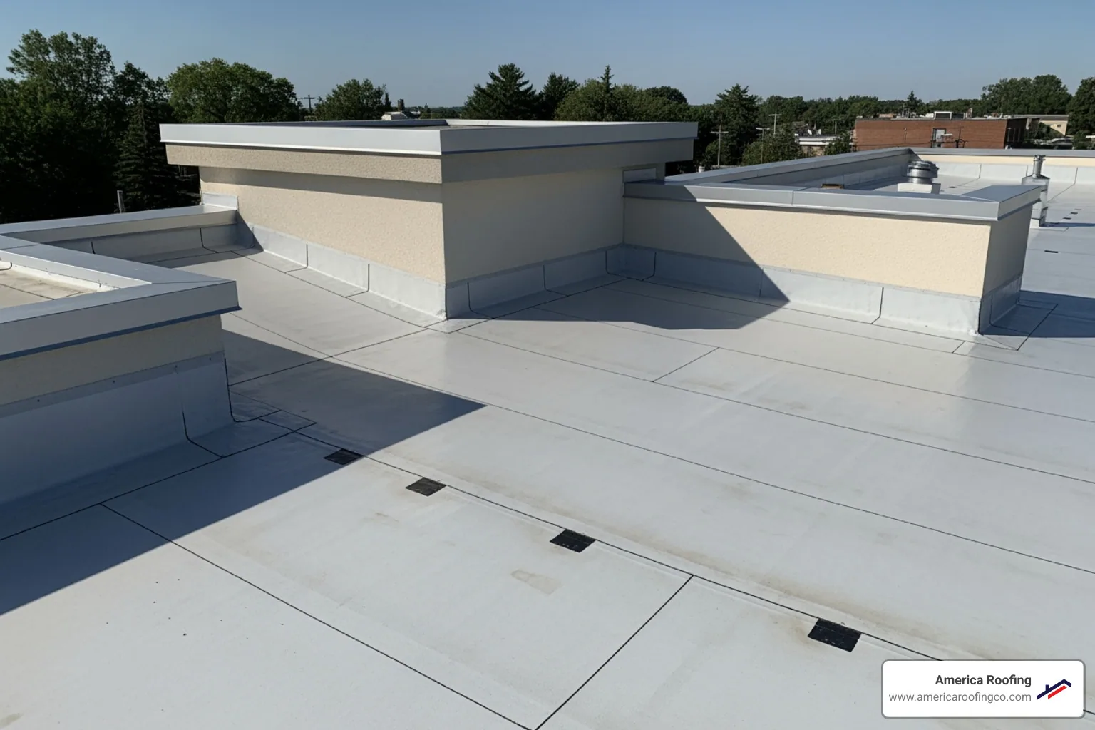 A professional technician using a hot-air welder to fuse TPO seams - tpo flat roof
