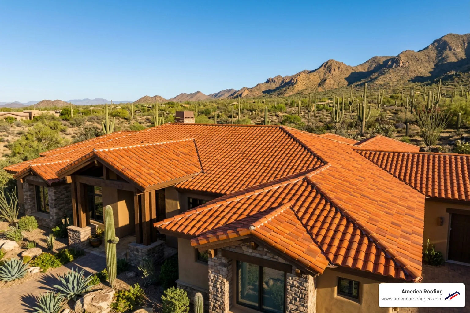 A premium clay tile roof installation on a luxury Arizona home showcasing deep orange hues and perfect alignment