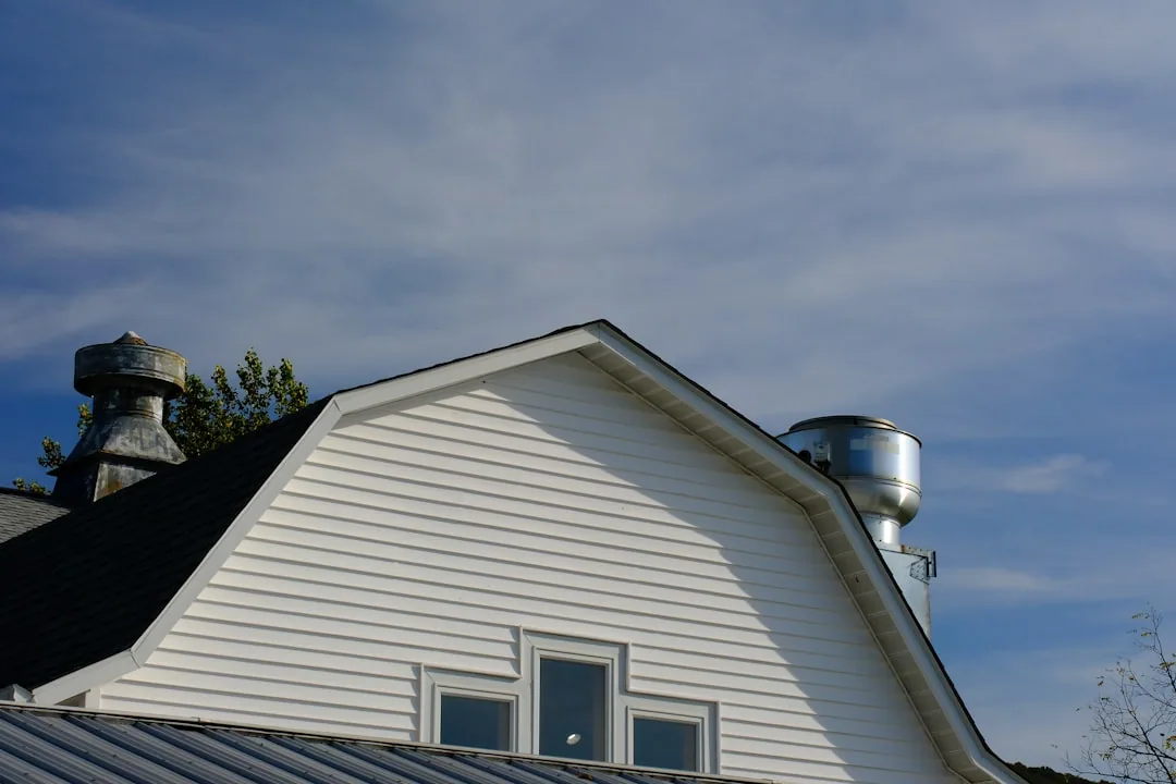a light-colored "cool roof" on a sunny day - roof replacement