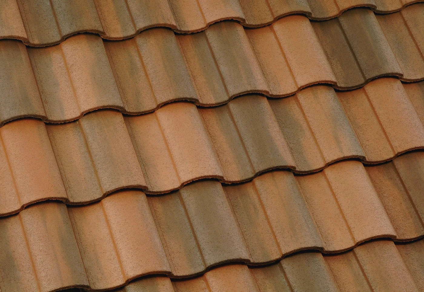 Eagle Capistrano concrete roof tile in 3645 Sunrise Blend