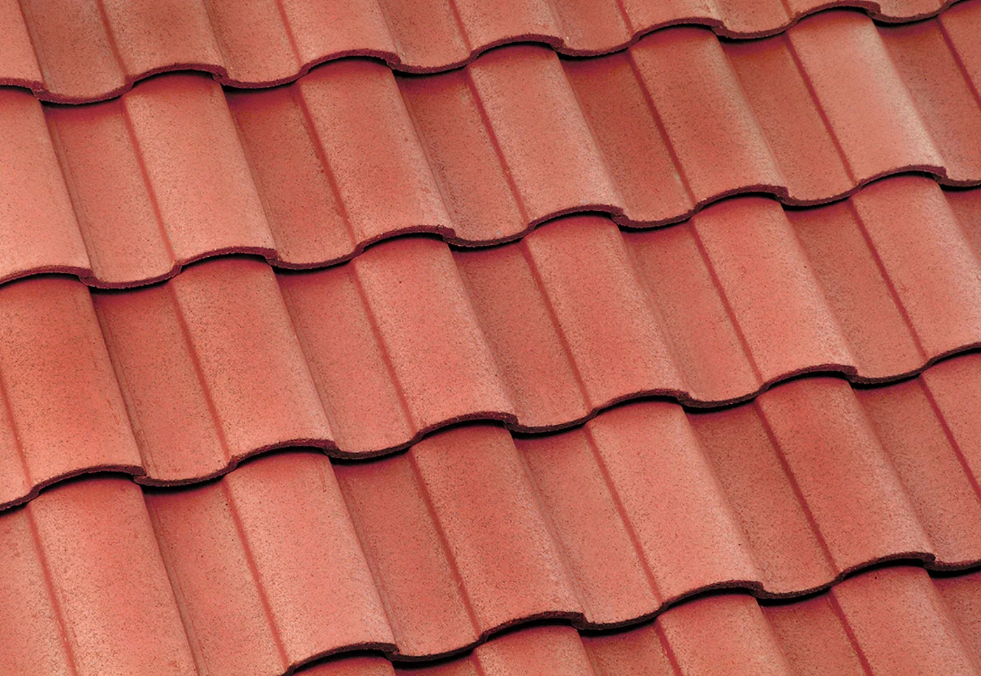 Eagle Capistrano concrete roof tile in 3698 Kona Red Range