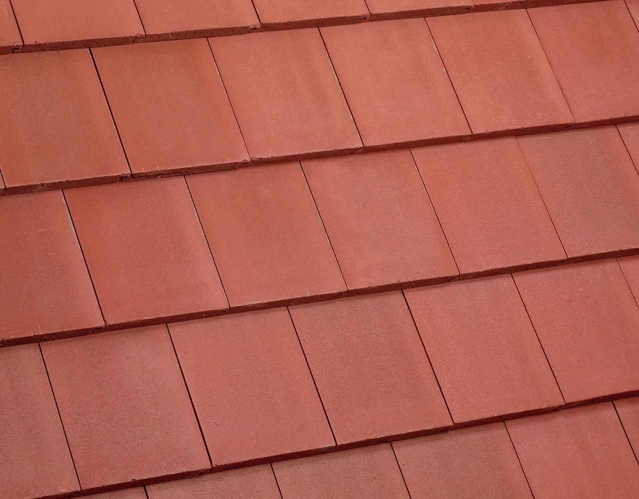 Eagle Bel Air concrete roof tile in 4698 Kona Red Range