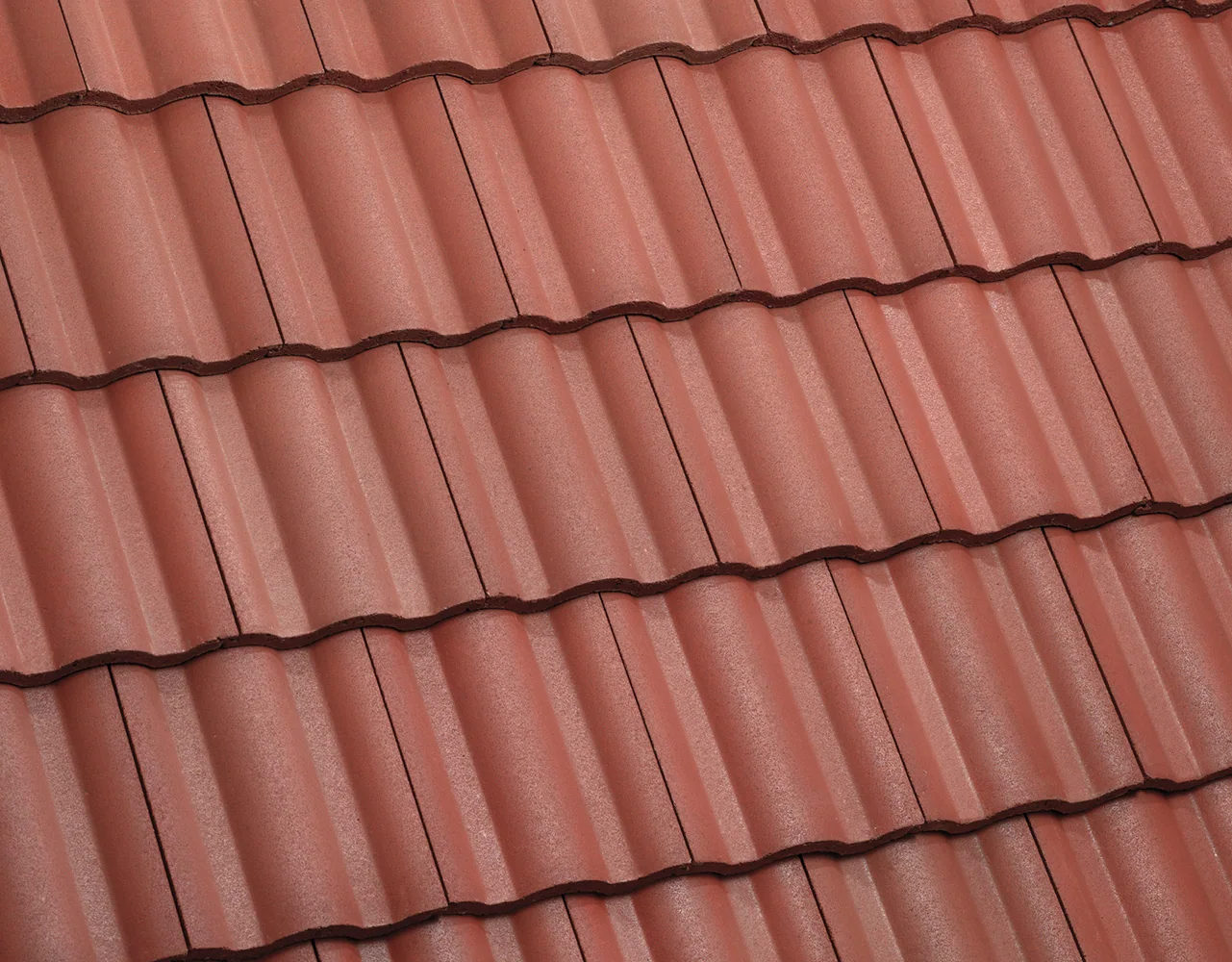 Eagle Malibu concrete roof tile in 498 Kona Red Range