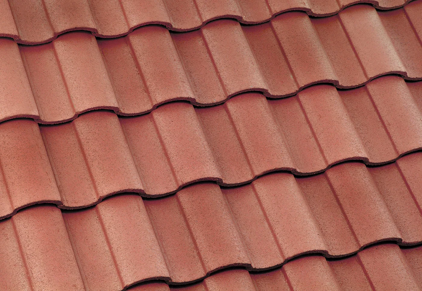 Eagle Capistrano concrete roof tile in 598 Kona Red Range