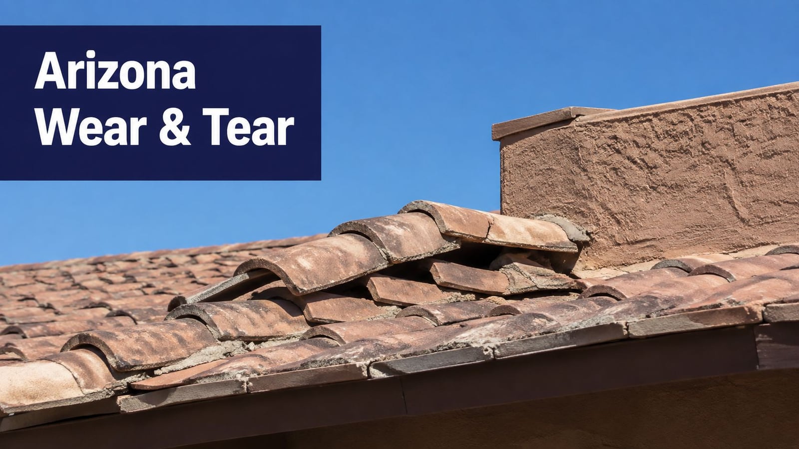 A close-up view of a damaged residential roof with displaced and cracked clay roof tiles.